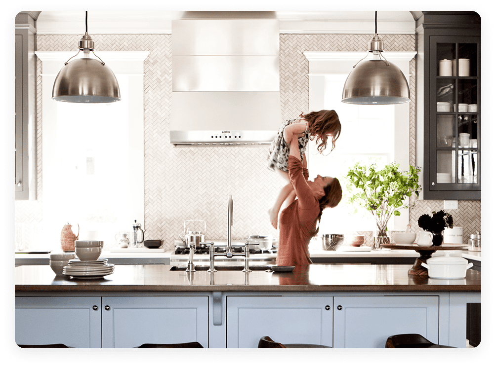 A mom and child in the kitchen