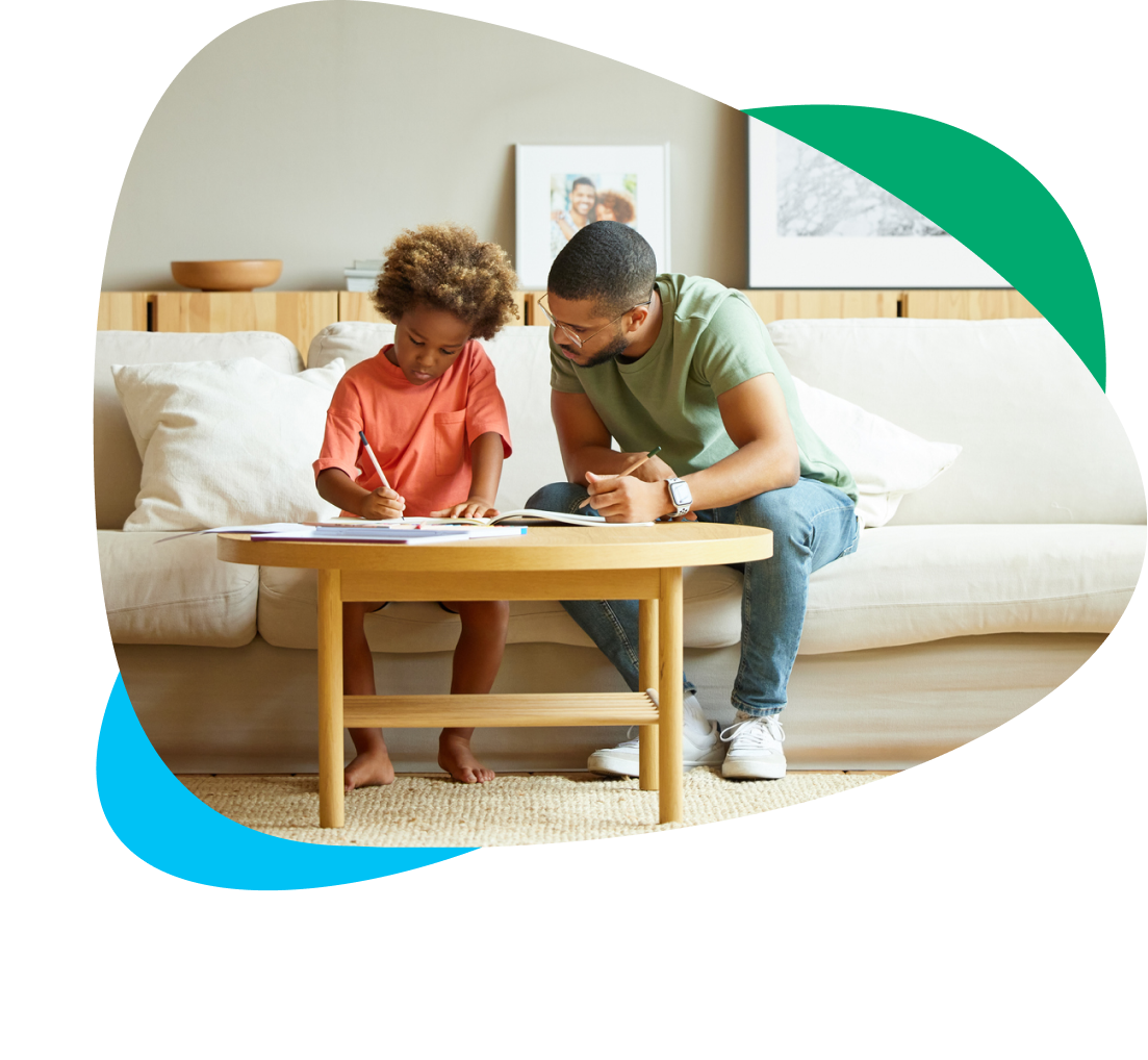 Man helping child with homework